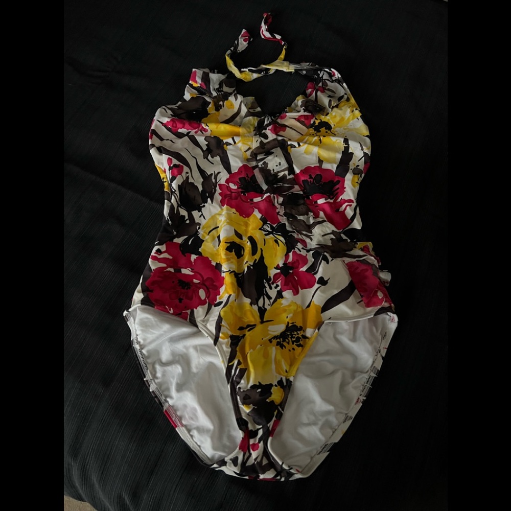 1pc bathing suit with diagonal ruffle, halter top.